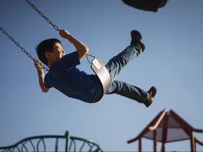 Child on swing- Families Advocating for Chemical & Toxics Safety