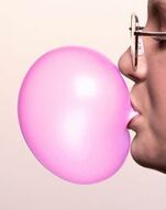 Person blowing bubblegum bubble- Families Advocating for Chemical & Toxics Safety